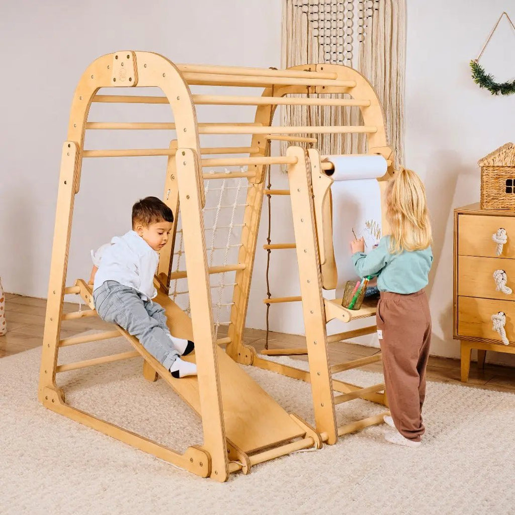 8-in-1 Indoor Playground: Climbing Frame with Climbing Net, Slide, Gymnastic Rings, Hanging Ladder, Disc Swing, Chalkboard, and High Chair – Beige
